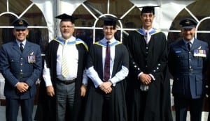 The proud graduates and some of their tutors